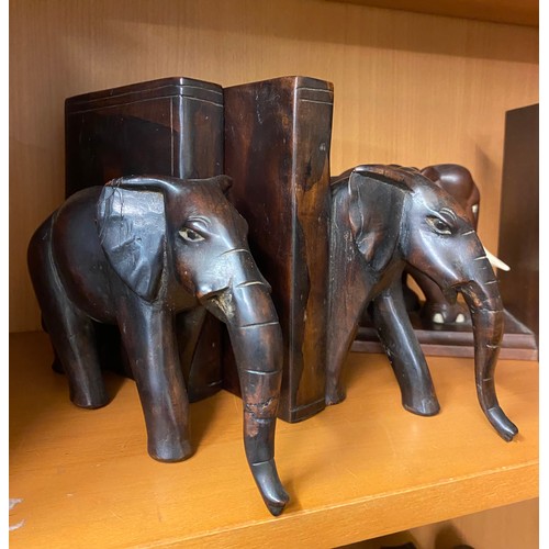 386 - TWO PAIRS OF CARVED ELEPHANT BOOKENDS