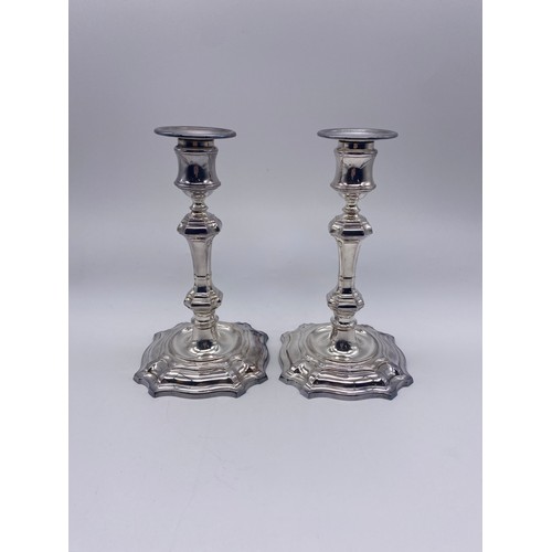 437 - PAIR OF SHEFFIELD SILVER MID 18TH CENTURY STYLE CANDLE STICKS 21.8 OZ OVERALL APPROX