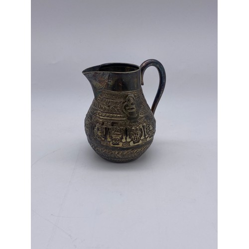 436 - UNMARKED EASTERN METALWARE JUG DECORATED WITH ASTROLOGICAL MEDALLIONS