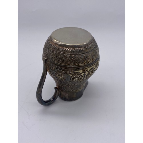 436 - UNMARKED EASTERN METALWARE JUG DECORATED WITH ASTROLOGICAL MEDALLIONS