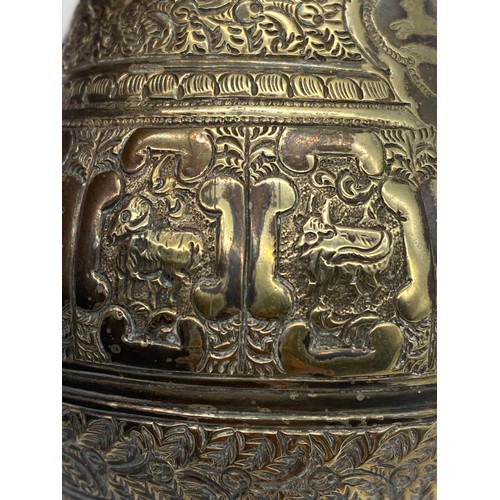 436 - UNMARKED EASTERN METALWARE JUG DECORATED WITH ASTROLOGICAL MEDALLIONS