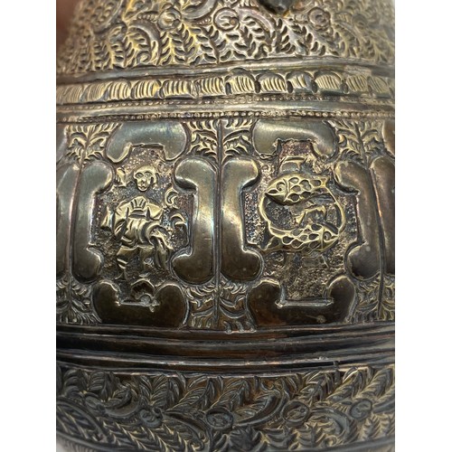 436 - UNMARKED EASTERN METALWARE JUG DECORATED WITH ASTROLOGICAL MEDALLIONS