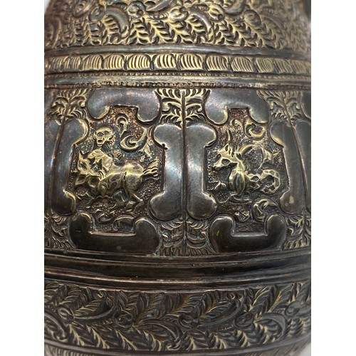 436 - UNMARKED EASTERN METALWARE JUG DECORATED WITH ASTROLOGICAL MEDALLIONS