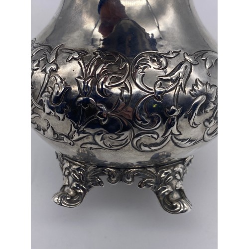 445 - GEORGIAN SILVER CREAM JUG WITH FOLIATE HANDLE 9.4 OZ APPROX