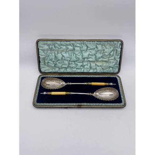 426 - CASED PAIR OF VICTORIAN ENGRAVED PLATED SERVERS