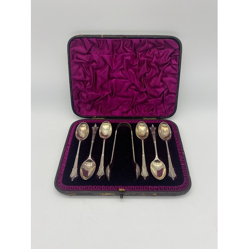 430 - CASED SET OF SIX SILVER TEASPOONS AND PAIR OF SUGAR TONGS 4.2 OZ APPROX