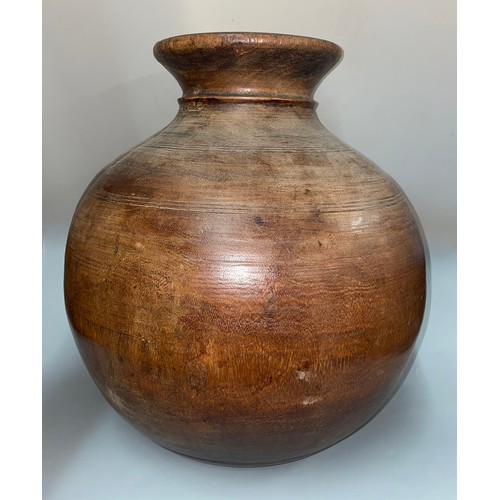 329 - HEAVY CARVED WOODEN GLOBULAR VASE