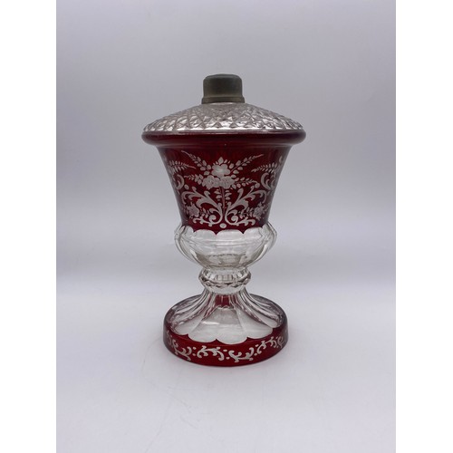 499 - BOHEMIAN RUBY ETCHED PANELLED LAMP BASE, RUBY ETCHED VASE WITH SILVER COLLAR AND A GRAPE VINE DECORA... 