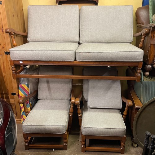 130 - ERCOL STYLE OAK FRAMED LOOSE CUSHION SOFA AND TWO MATCHING ARMCHAIRS