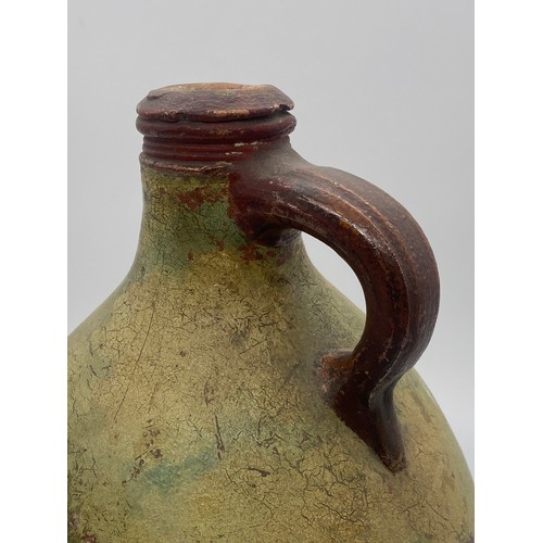 375 - STONEWARE FLAGON WITH PAINTED TOWN DECORATION SIGNED B.ARCHER