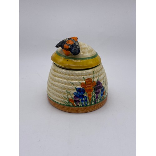 348 - CLARICE CLIFF BIZARRE CROCUS HONEY SKEP PRESERVE JAR AND BIZARRE RHODANTHE PRESERVE JAR