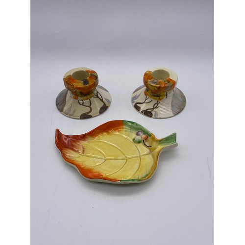 349 - PAIR OF CLARICE CLIFF RHODANTHE PATTERN CANDLE HOLDERS AND CLARICE CLIFF 922 LEAF TRAY