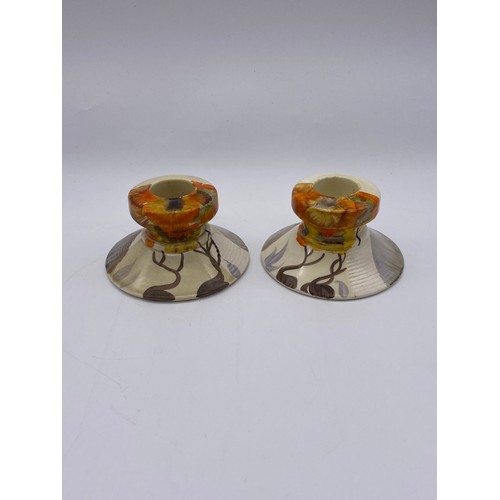 349 - PAIR OF CLARICE CLIFF RHODANTHE PATTERN CANDLE HOLDERS AND CLARICE CLIFF 922 LEAF TRAY