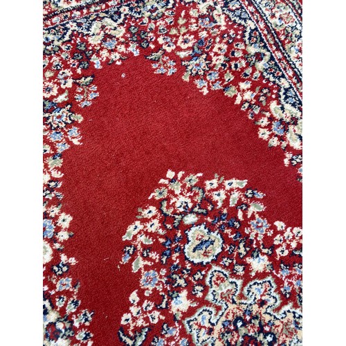 152 - RED FLORAL GROUND RUG L150CM X W80CM