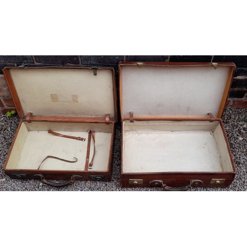 178 - SET OF FOUR EARLY 20TH CENTURY STITCHED LEATHER SUITCASES