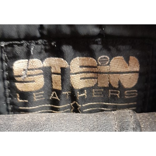 27 - STEIN BLACK MOTOR CYCLISTS ZIPPER JACKET AND TROUSERS