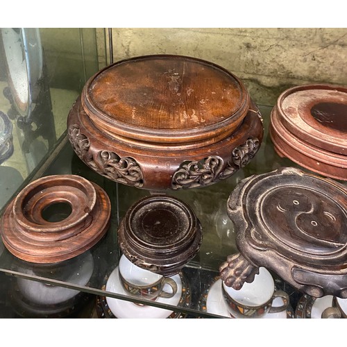 530 - SELECTION OF ORIENTAL CARVED HARDWOOD VASE AND BOWL STANDS