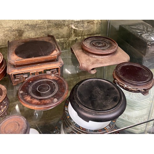 530 - SELECTION OF ORIENTAL CARVED HARDWOOD VASE AND BOWL STANDS