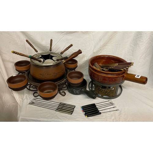 361 - RETRO CAROUSEL FONDUE SET, LANDERT, EMBOSSED COW FONDUE SET, AND BRASS AND HARDWOOD HANDLED CUTLERY