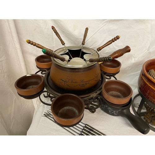 361 - RETRO CAROUSEL FONDUE SET, LANDERT, EMBOSSED COW FONDUE SET, AND BRASS AND HARDWOOD HANDLED CUTLERY