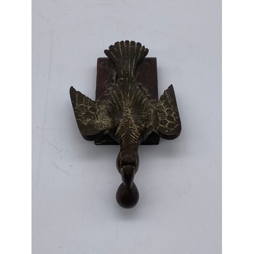 832 - PAINTED METALWORK EAGLE FIGURE, METAL WORK BIRD AND A FOLK ART TYPE WOODEN PRESS STAND