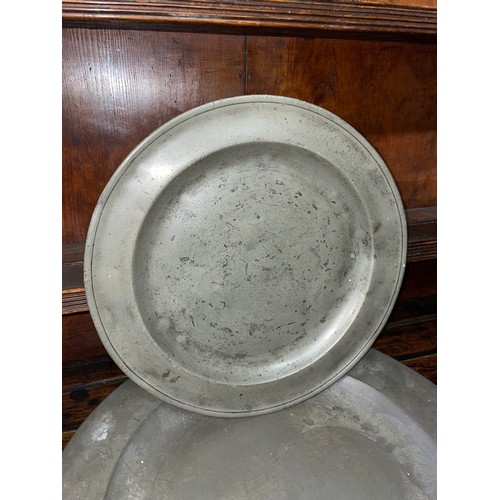 369 - SEVEN 18/19TH CENTURY PEWTER LARGE PLATES AND SHALLOW BOWL, VARIOUS TOUCH MARKS