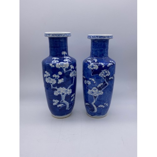 746 - PAIR OF CHINESE BLUE AND WHITE BALUSTER VASES DECORATED WITH PRUNUS WITH FOUR CHARACTER MARK TO BASE...