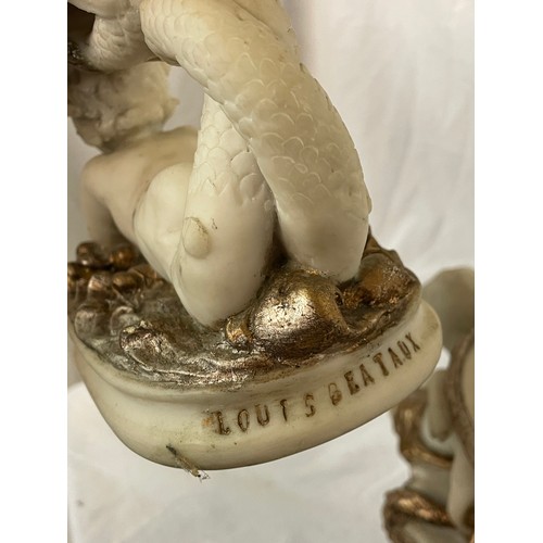 694 - AFTER LOUIS BEATAUX IMITATION MARBLE CHERUB AND MERMAID CENTRE PIECE GARNITURE