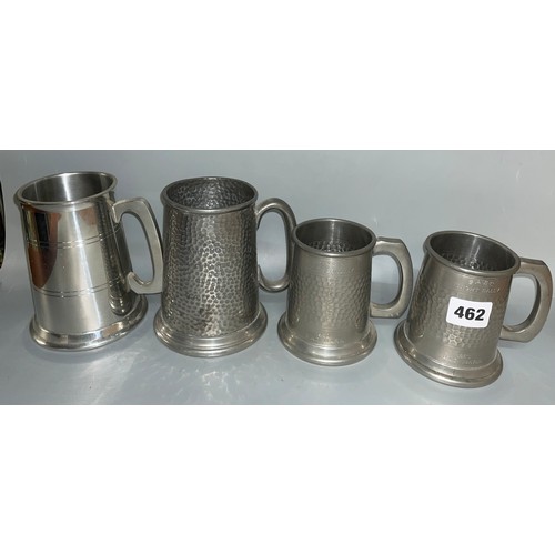 462 - THREE BEATEN PEWTER TANKARDS AND ONE PLAIN SELMARK PEWTER TANKARD