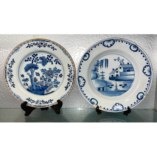 475 - TWO DELFT EARTHEN WARE BLUE AND WHITE PLATES