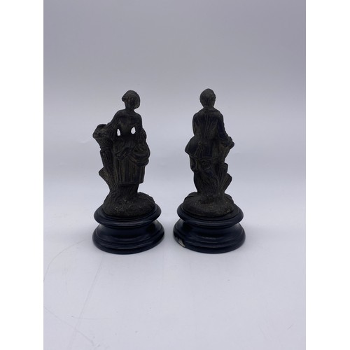 725 - PAIR OF MINIATURE METAL WORK FIGURES OF FLOWER SELLERS