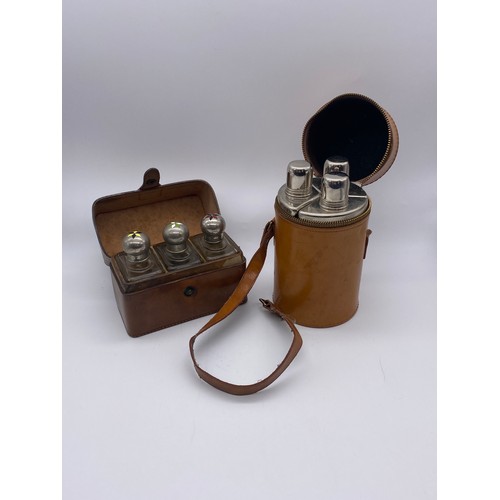 806 - LEATHER CYLINDRICAL THREE GLASS SPIRIT FLASK AND A LEATHER CASED TRAVELLING TRIPLE FLASK WITH ENAMEL... 