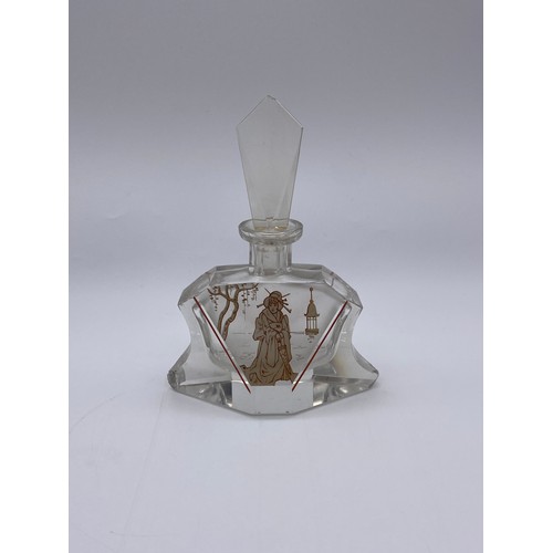 756 - ART DECO GLASS SHAPED SCENT BOTTLE DECORATED WITH A GEISHA