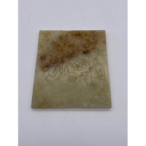 770 - CELADON JADE AND RUSSET TILE PANEL INCISED WITH A SCHOLAR AND FOLIAGE