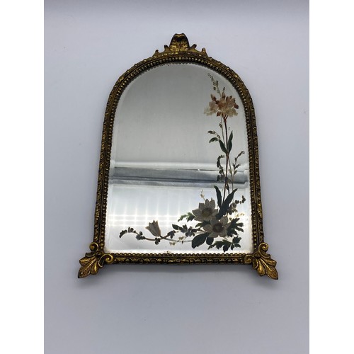 858 - GILT METAL ARCH FRAMED MIRROR WITH PAINTED FLORAL DECORATION