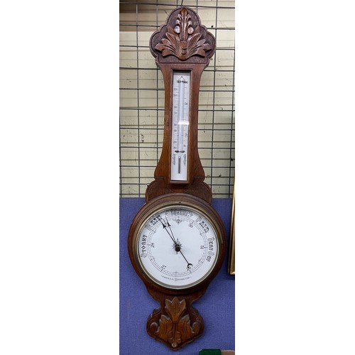 314 - CARVED CASED ANEROID BAROMETER