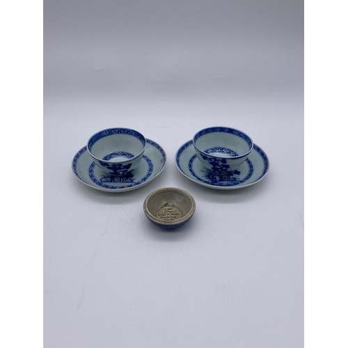 757 - TWO NAN KING CARGO CHINESE TEA BOWLS AND SAUCERS DECORATED WITH PINE TREES