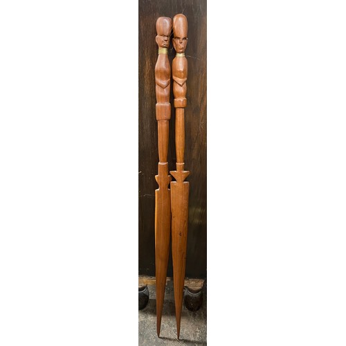 820 - PAIR OF 20TH CENTURY SOUVENIR CARVED SPEARS