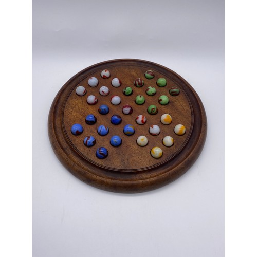 795 - SOLITAIRE BOARD AND SELECTION OF COLOURED GLASS MARBLES WITH SOME SPARES