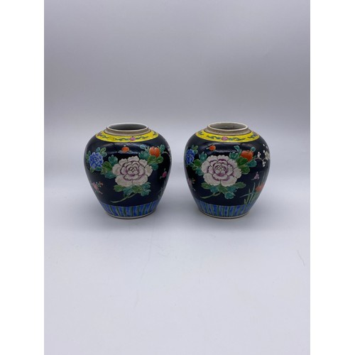 753 - PAIR OF CHINESE FAMILLE NOIR OVOID VASES DECORATED WITH FLOWERS 15cm H