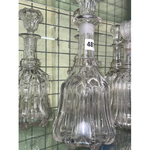 481 - EIGHT 19TH CENTURY RIBBED MALLET DECANTERS AND STOPPERS