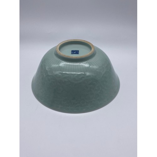 750 - CHINESE CELADON GLAZED BOWL WITH INCISED FOLIATE PATTERN 25cm D