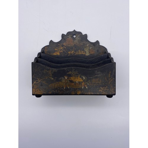 863 - 19TH CENTURY JAPANESE LETTER RACK WITH LAQUERED DECORATION OF FIGURES AND A CLAY PAPIER MACHE PEN TR... 