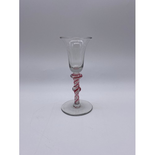 869 - 18TH CENTURY WINE GLASS WITH BELL BOWL ON A KNOPPED RUBY AND OPAQUE AIR TWIST STEM