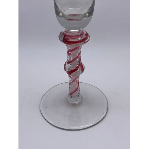 869 - 18TH CENTURY WINE GLASS WITH BELL BOWL ON A KNOPPED RUBY AND OPAQUE AIR TWIST STEM