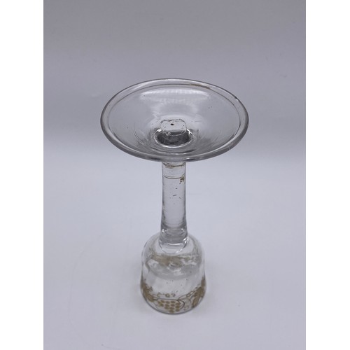 875 - 18TH CENTURY JACOBITE WINE GLASS WITH ETCHED GRAPE VINE DECORATION ON A FOLDED FOOT