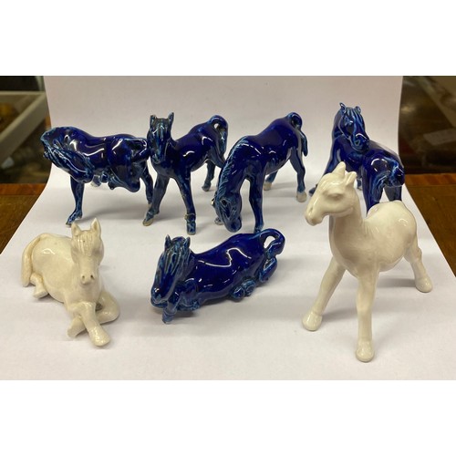 856 - SELECTION OF BLANC DE CHINE AND BLUE GLAZED POSSIBLY CHINESE HORSE FIGURES A/F