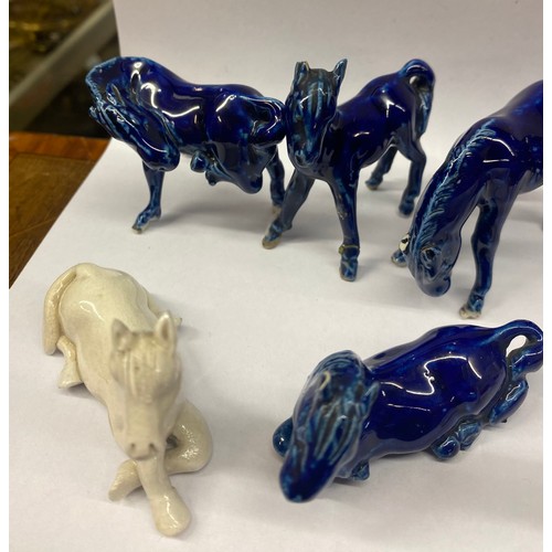 856 - SELECTION OF BLANC DE CHINE AND BLUE GLAZED POSSIBLY CHINESE HORSE FIGURES A/F