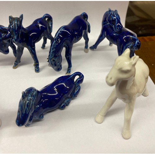 856 - SELECTION OF BLANC DE CHINE AND BLUE GLAZED POSSIBLY CHINESE HORSE FIGURES A/F