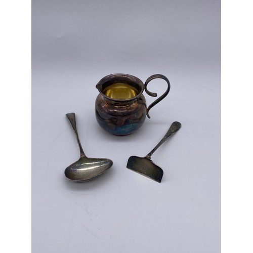 435 - SILVER BABY'S PUSHER AND A FEEDER SPOON 1.1 OZ APPROX AND A SMALL EPNS CREAM JUG